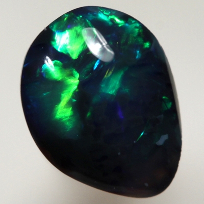 SOLID BLACK OPAL  Bright and rich rolling flashes of turquoise, green and blue